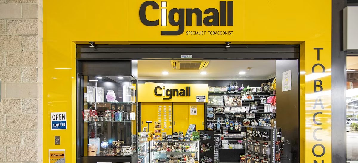 Specialist tobacconist storefront with accessories, lighters and counter range on display
