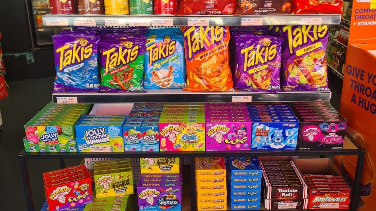 USA drinks and imported snacks merchandised as adjacent impulse lines